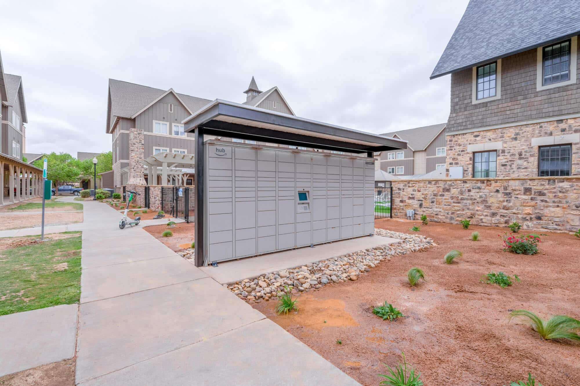 the collective at lubbock off campus cottage apartments near texas tech ttu amazon hub package locker system